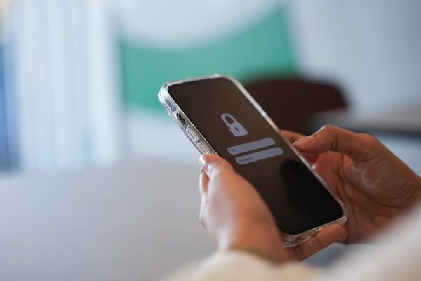 User entering a time-based token on mobile to access TrackonAI